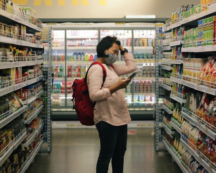 Woman shopping in supermarket